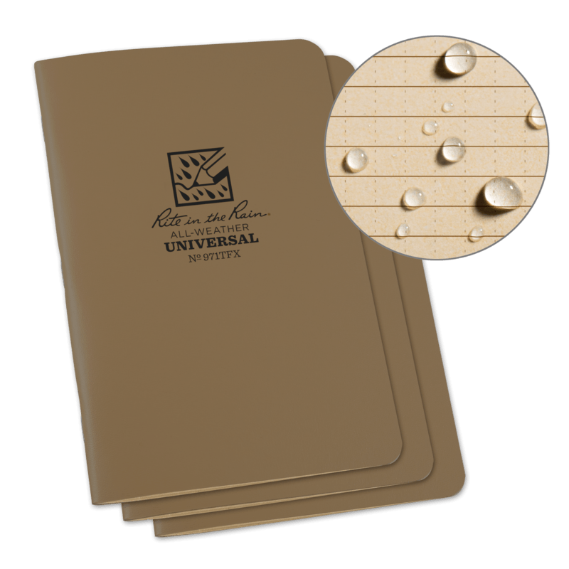 Rite in the Rain Field-Flex Universal Stapled Notebook 4.625 x 7 with water droplets, showcasing all-weather durability.