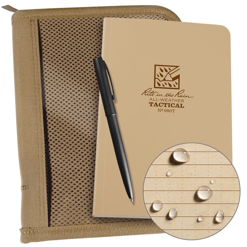 Rite in the Rain Land Nav Kit with tan cover, all-weather notebook, and metal pen for outdoor navigation.