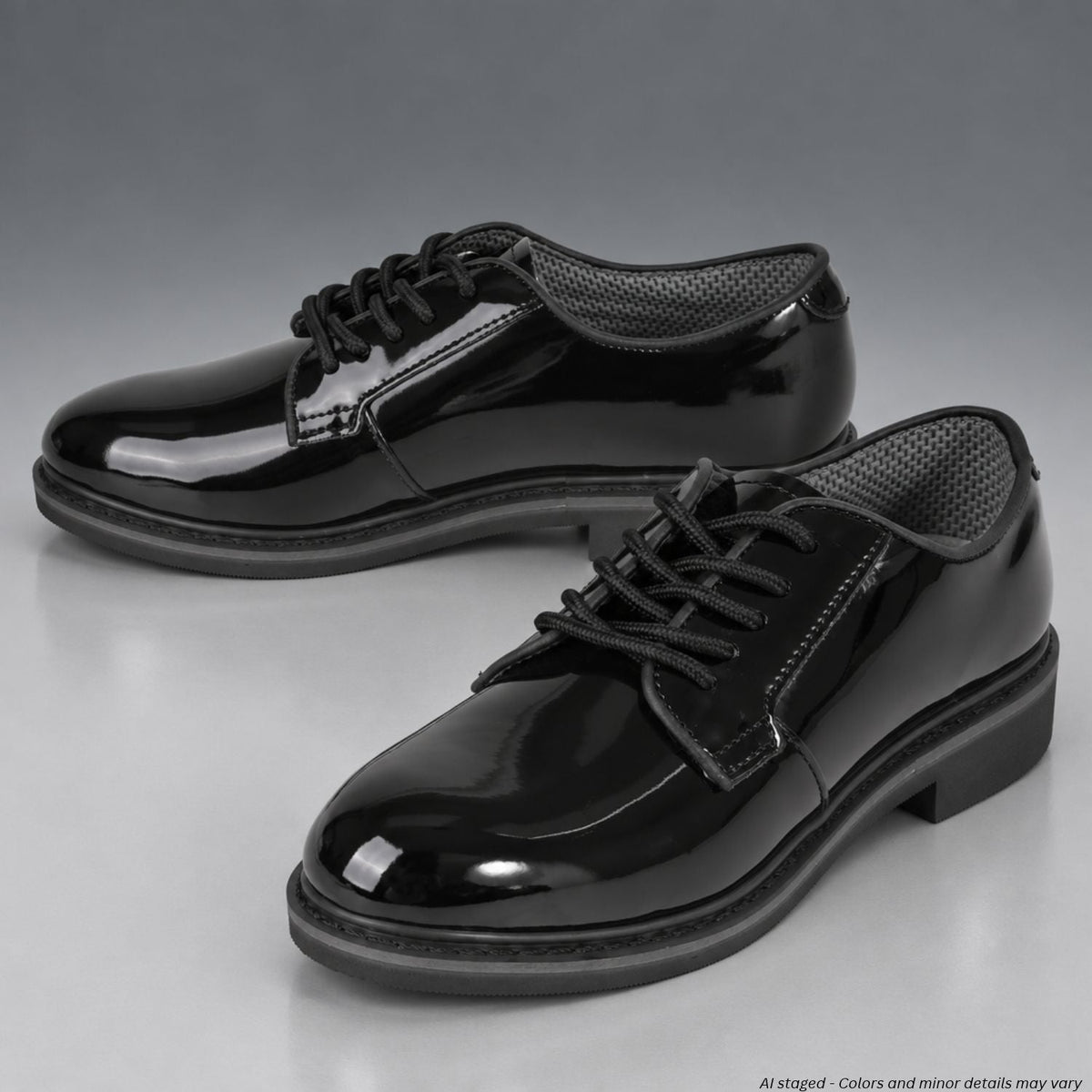 Pair of Rothco 5055 black hi-gloss Oxford dress shoes with lace-up fronts and mesh lining on a gray studio background