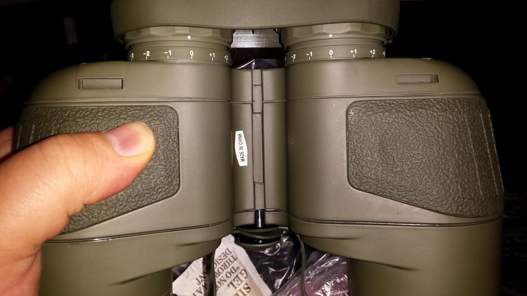 Rothco Military Type 7 x 50MM Binoculars (Olive Drab Green) bottom view in hand