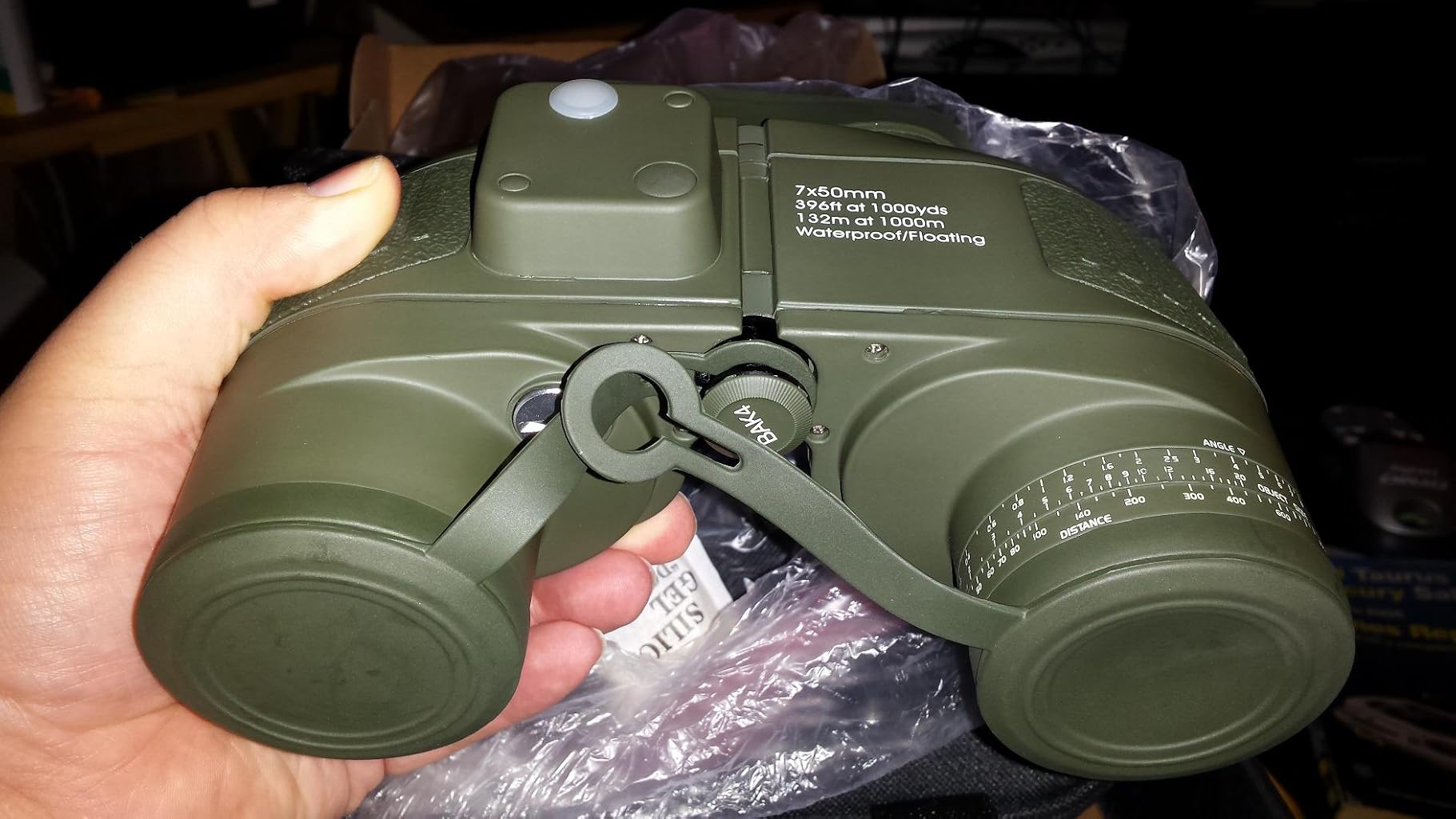 Rothco Military Type 7 x 50MM Binoculars (Olive Drab Green) in hand