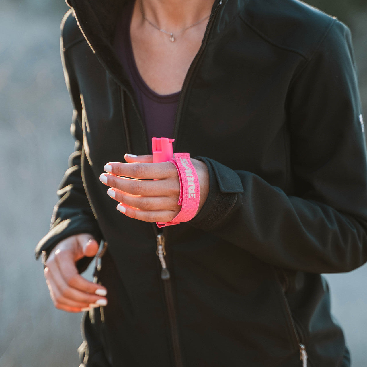 Sabre The Runner with Adjustable Reflective Hand Strap (black or pink)