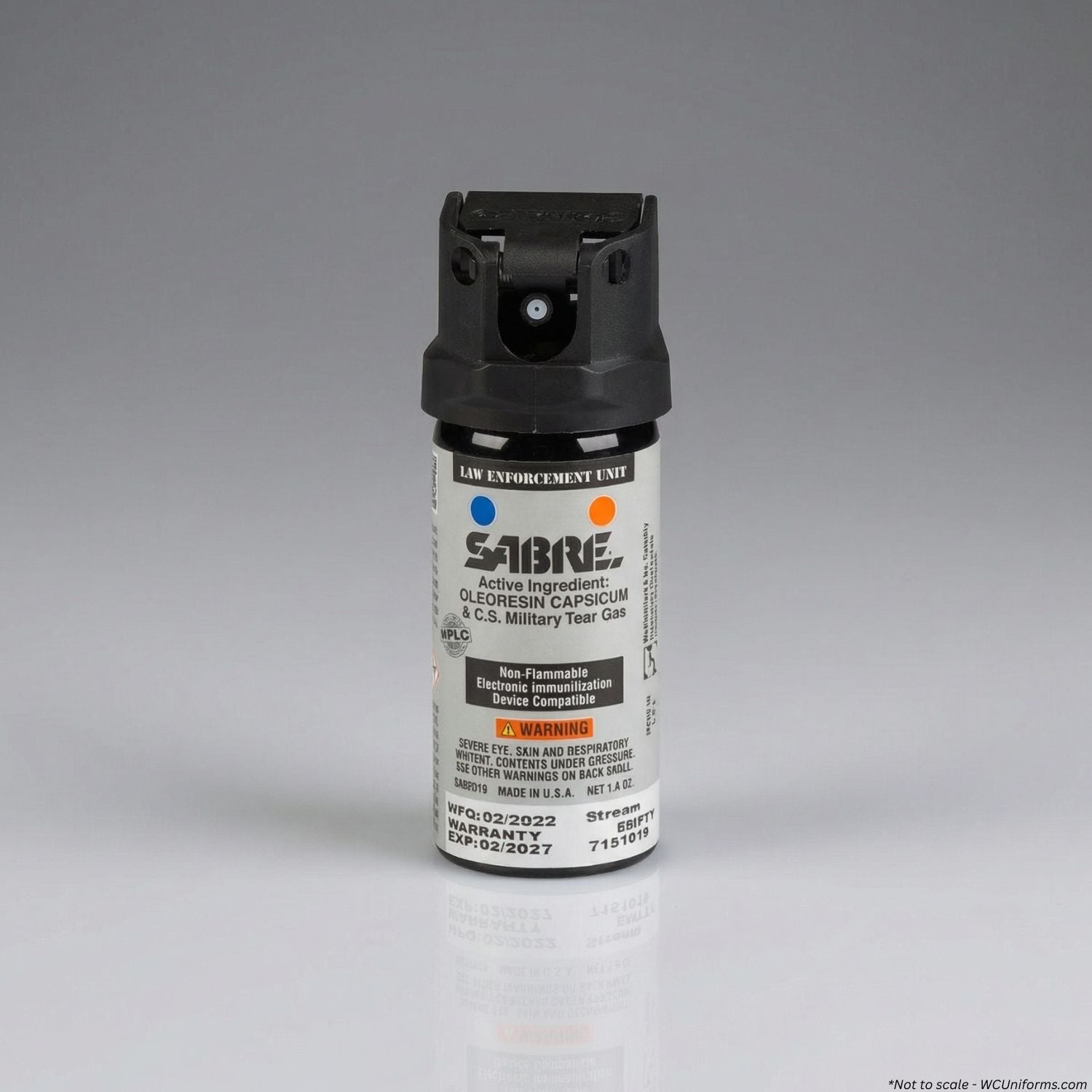 SABRE pepper spray canister on a gray background