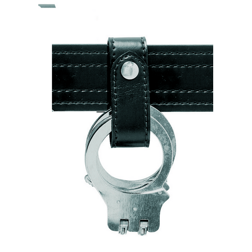Safariland Model 690 Handcuff Strap-Snap securing handcuffs to a duty belt, showcasing its 1-snap design for easy accessibility.