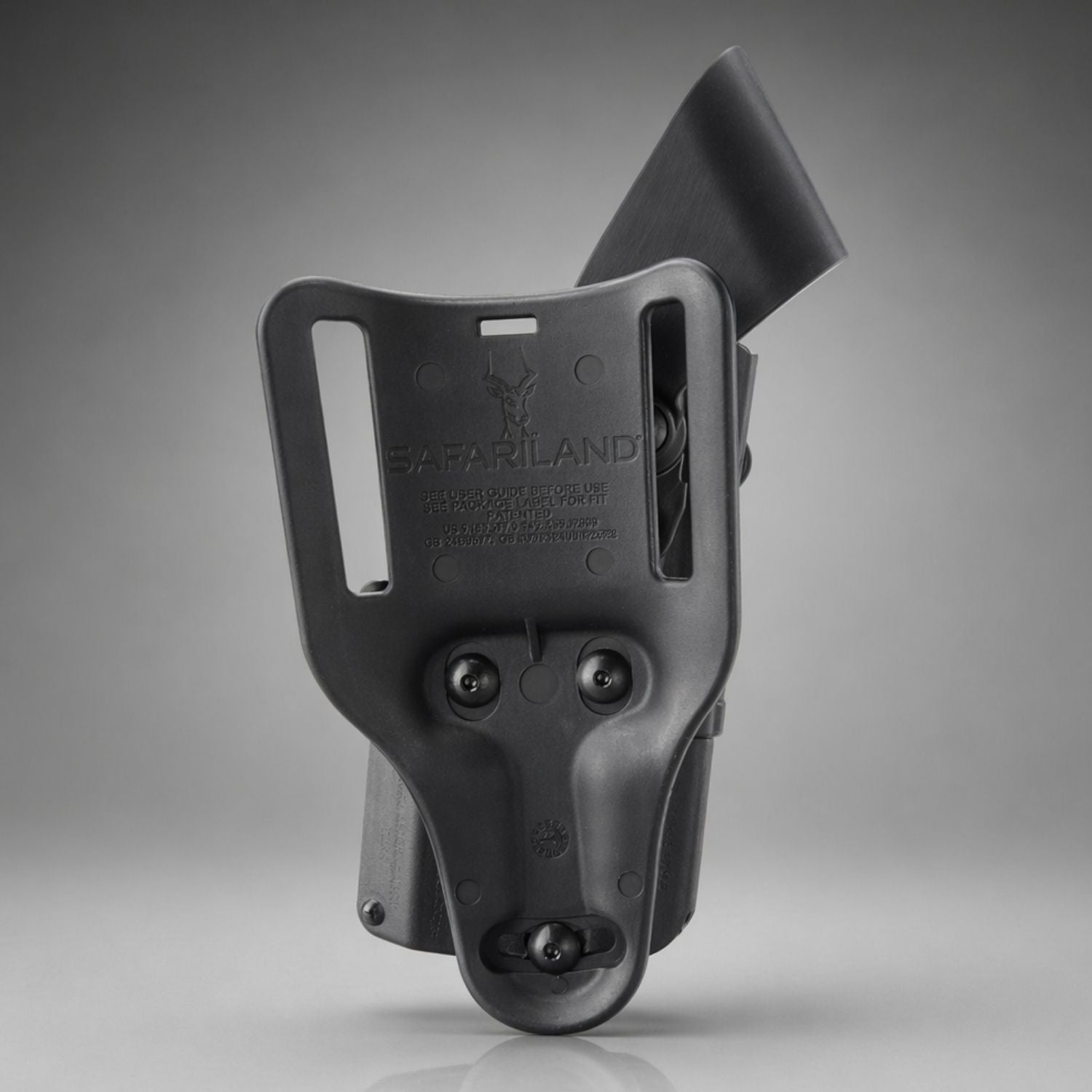 Black gun holster with visible Safariland branding on a gray background