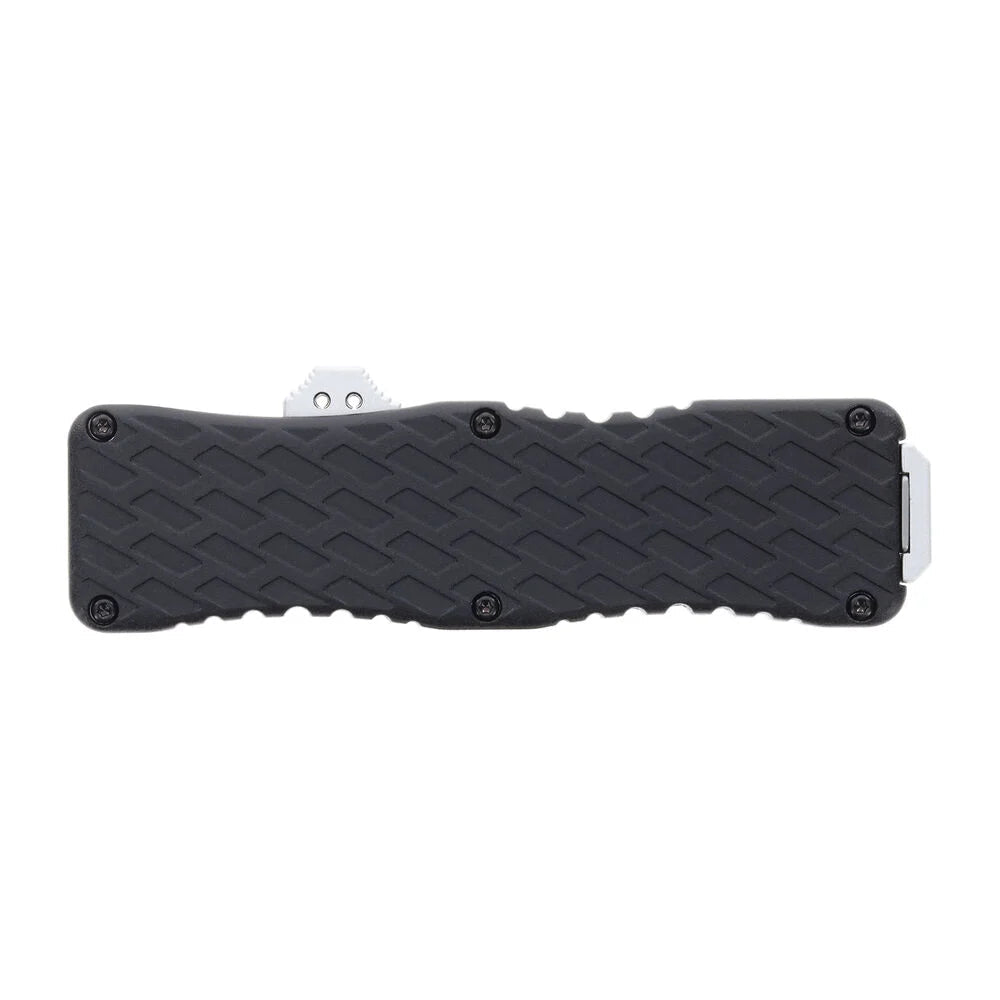Back of the closed Schrade Uproar OTF with textured aluminum handle, finger grooves, and thumb slide