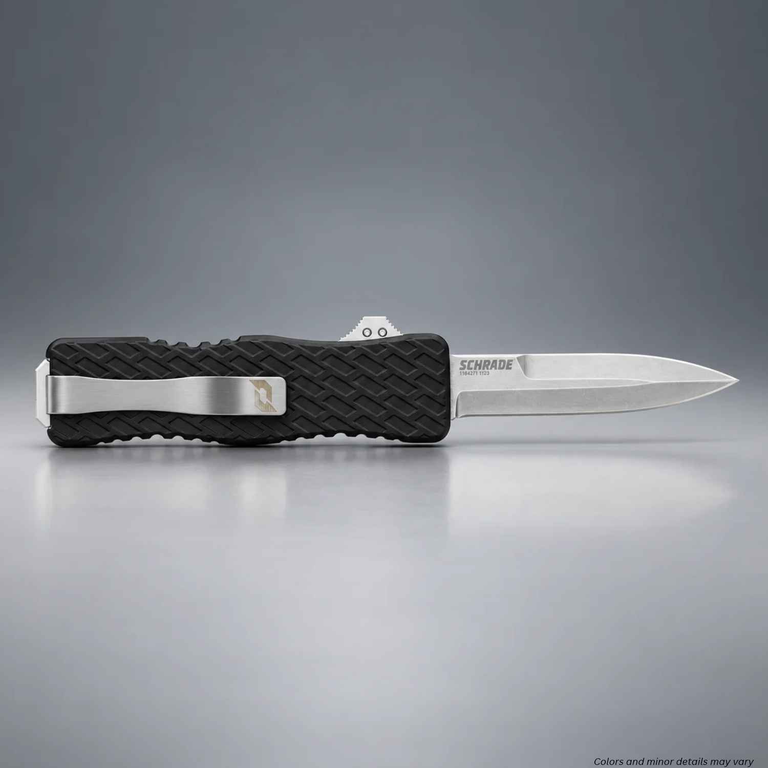 Schrade Uproar D/A OTF automatic knife 1135967 with 3-inch satin D2 dagger blade deployed and pocket clip