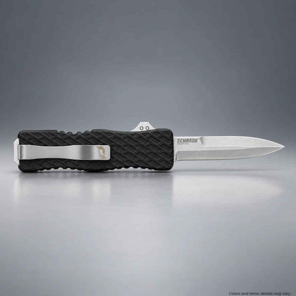 Schrade Uproar D/A OTF automatic knife 1135967 with 3-inch satin D2 dagger blade deployed and pocket clip