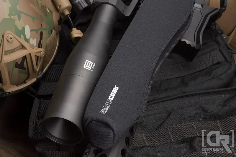 SENTRY 3mm Scopecoat covering a large-objective riflescope with shooting gear