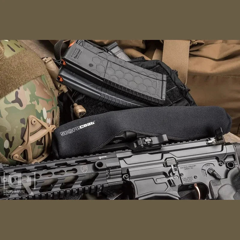 SENTRY 3mm Scopecoat fitted over a mounted riflescope with field gear laid out