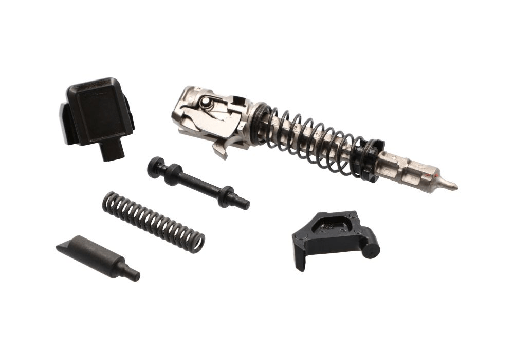 SIG SAUER P320 corrosion-resistant slide parts kit including extractor, striker group assembly, and springs.