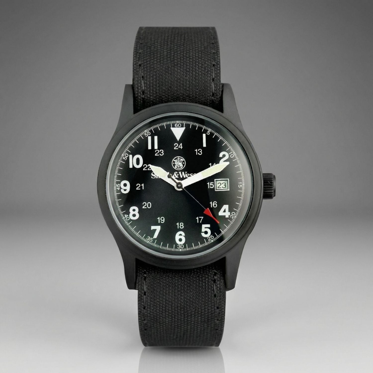 Black watch with a detailed face on a gray background