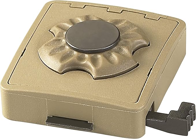 A gold-colored Streamlight Sidewinder Tactical NVG Mount with a quick-release button and a mounting rail.