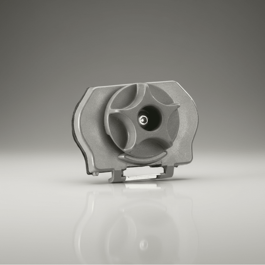 Streamlight Switch Assembly for Vantage® Helmet Light 691136-1 on a reflective surface with a gray gradient background