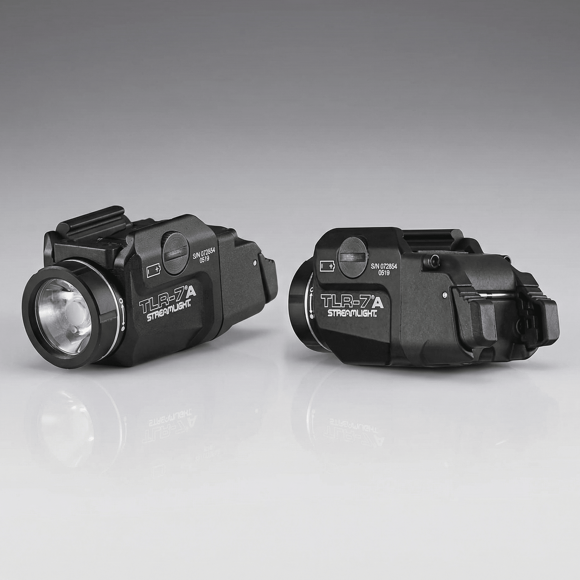 Two tactical Streamlight TLR-7A High Switch Weapon Light 500 Lumens 69423 with 'Streamlight' branding on a gray background