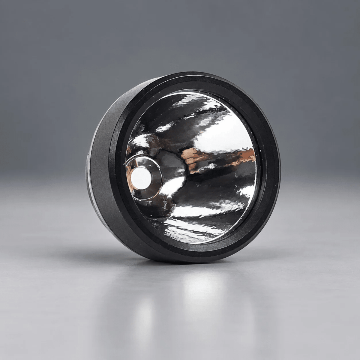 Streamlight TLR bezel facecap assembly 691305, front view of the small hole reflector and lens