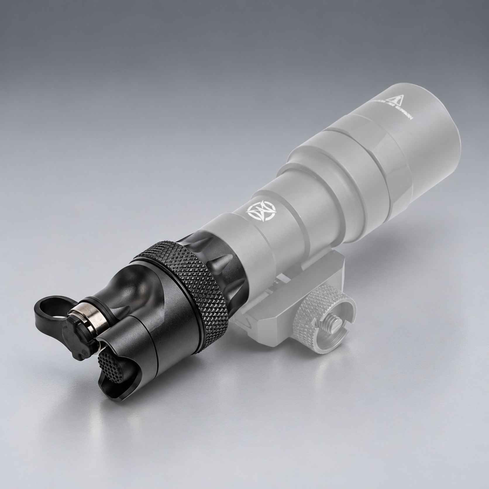 SureFire DS07 black push-button tailcap mounted on a Scout Light WeaponLight