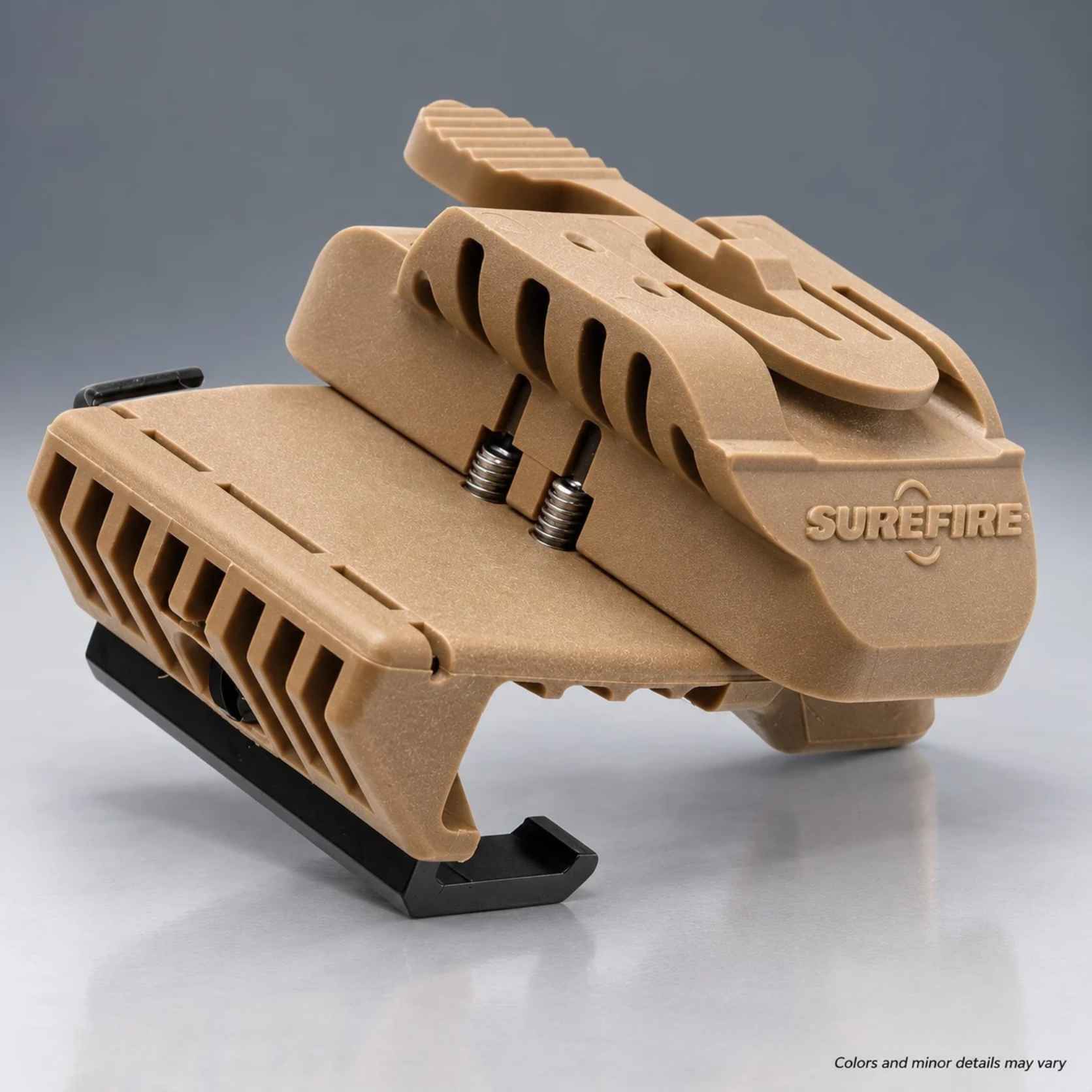 Tan SureFire HL1 MICH helmet mount, alternate angle showing the rim clamp body