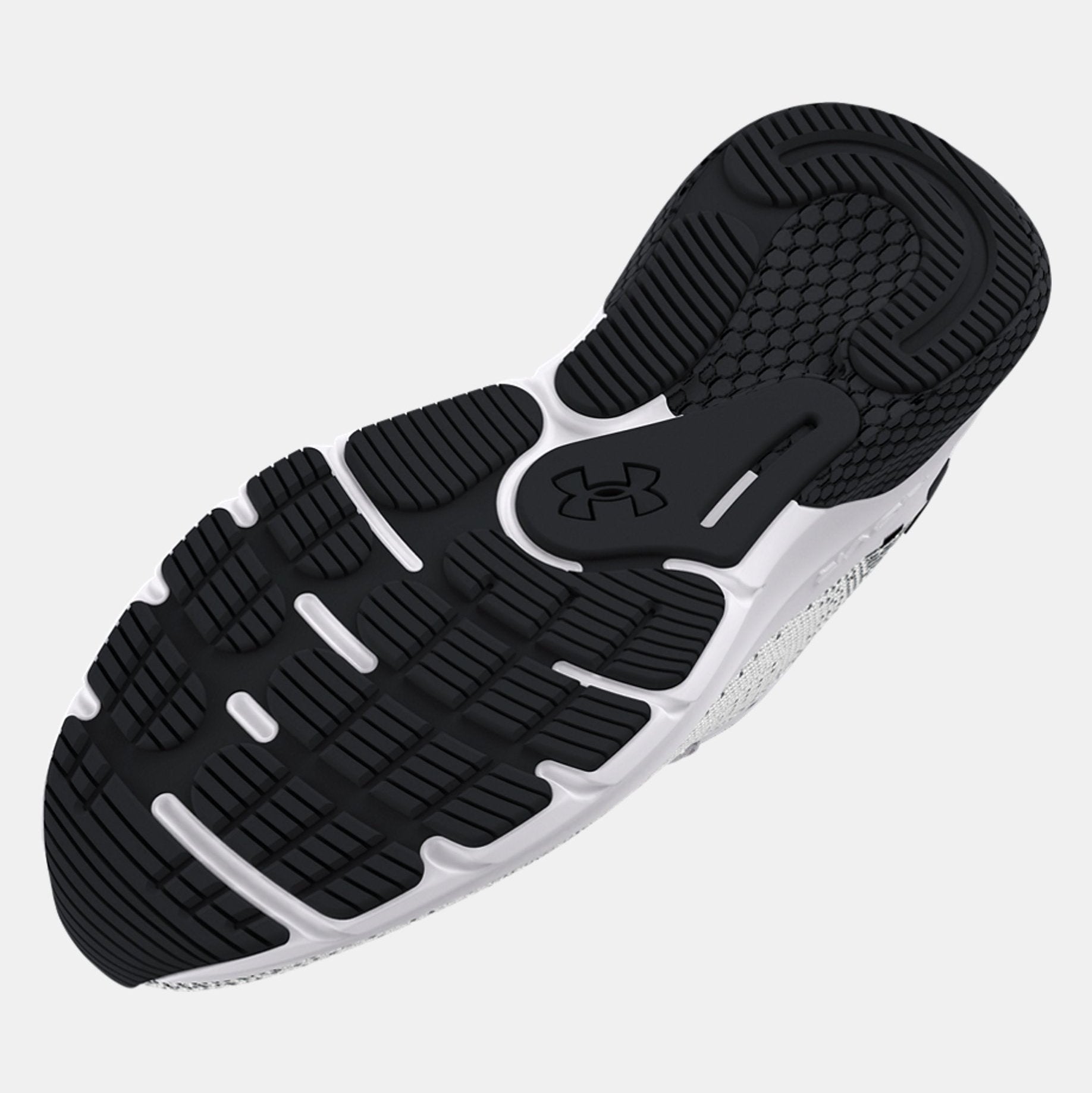 Black and white running shoe with an Under Armour brand logo on a light gray background