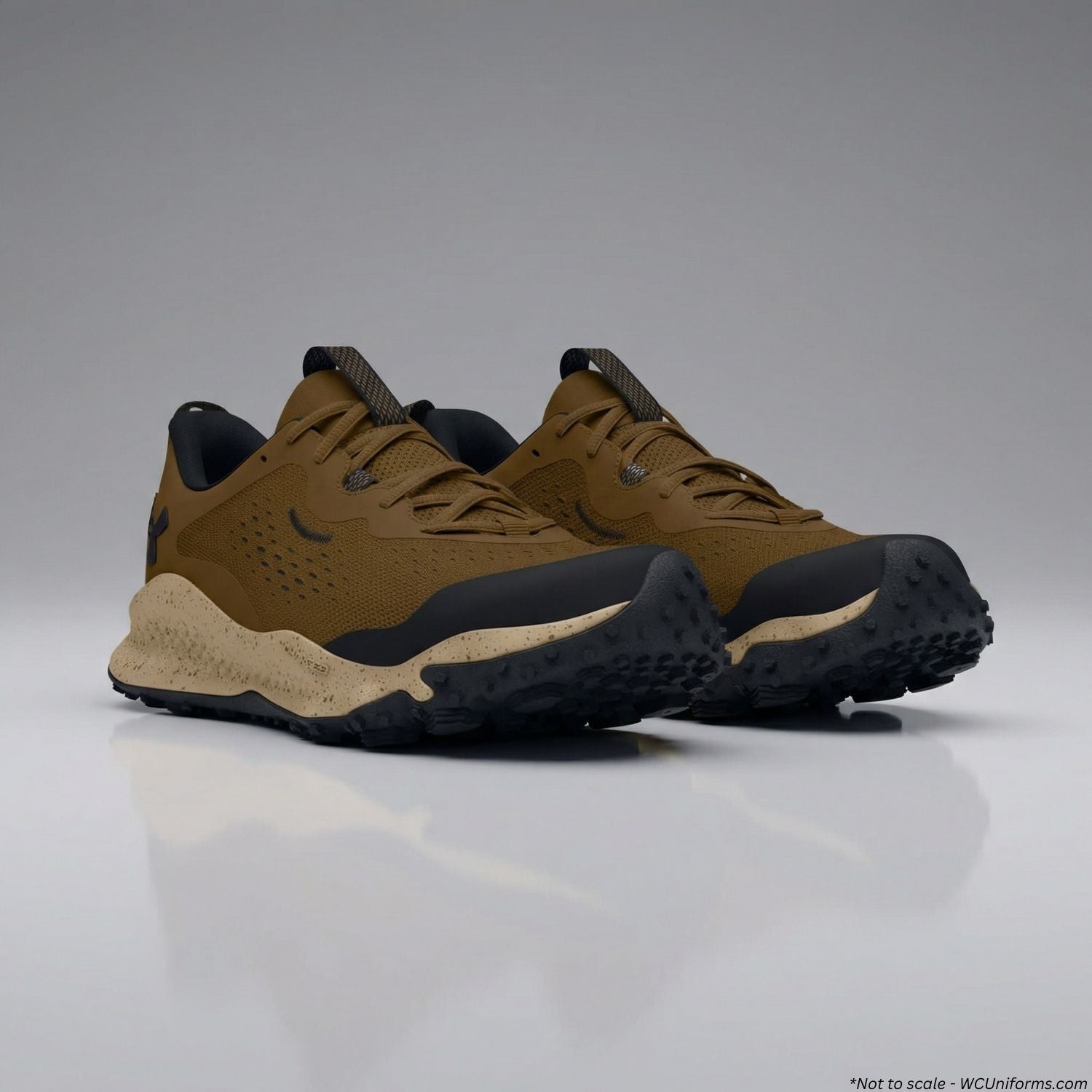 Brown and black sneakers on a gray background