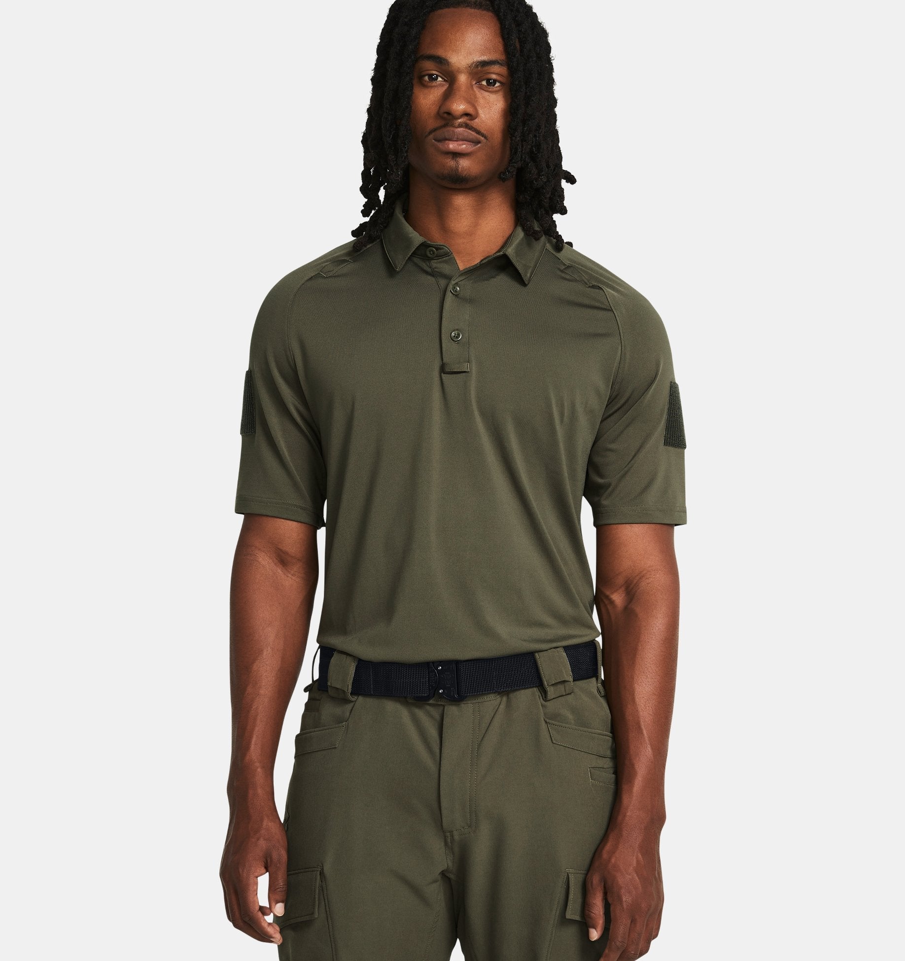 Under Armour Men's UA Tac Elite Polo 1379202 in green, showcasing breathable, lightweight, and tactical design for comfort and performance.