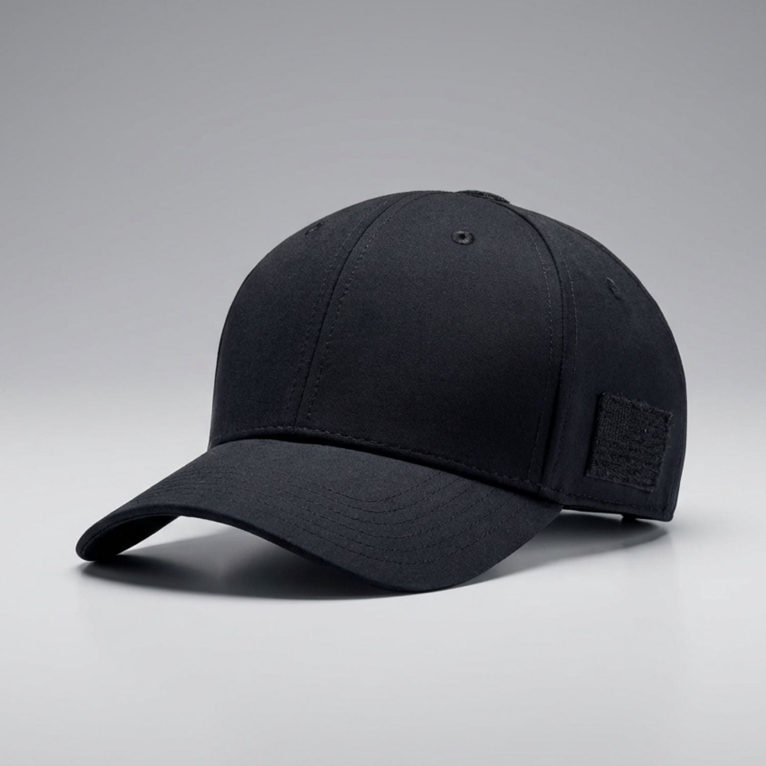 Black cap with a patch on a gray background