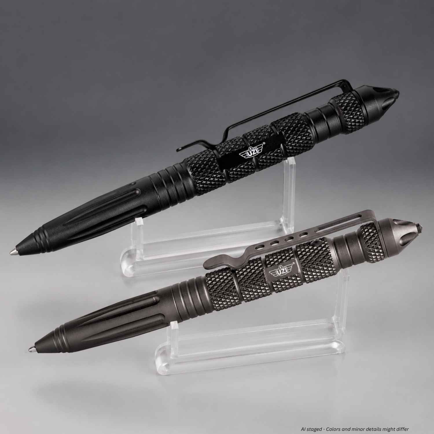 UZI Tactical Defender Pens in black and gunmetal gray on clear display stands