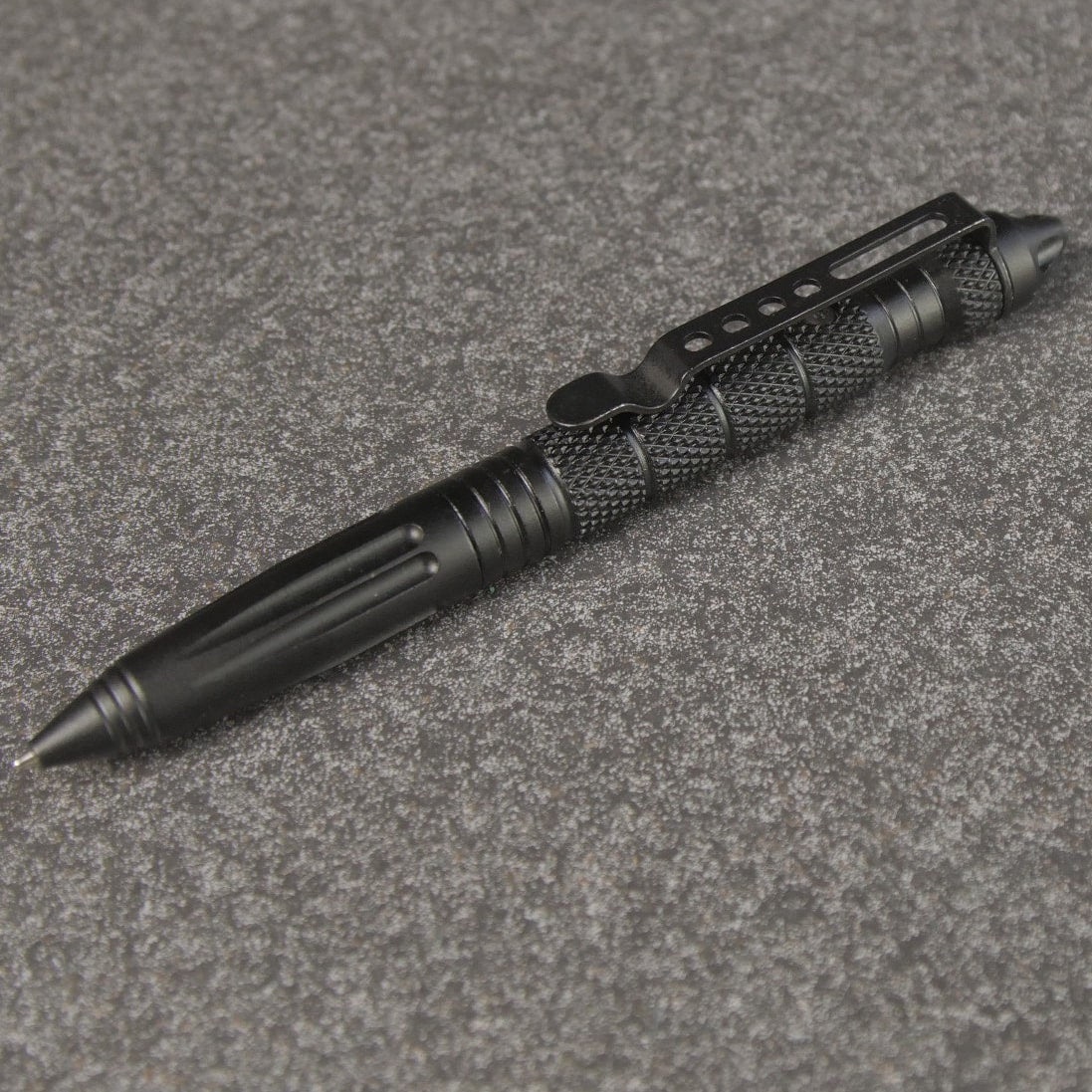 Black UZI Tactical Defender Pen with ballpoint tip and carbide glass breaker