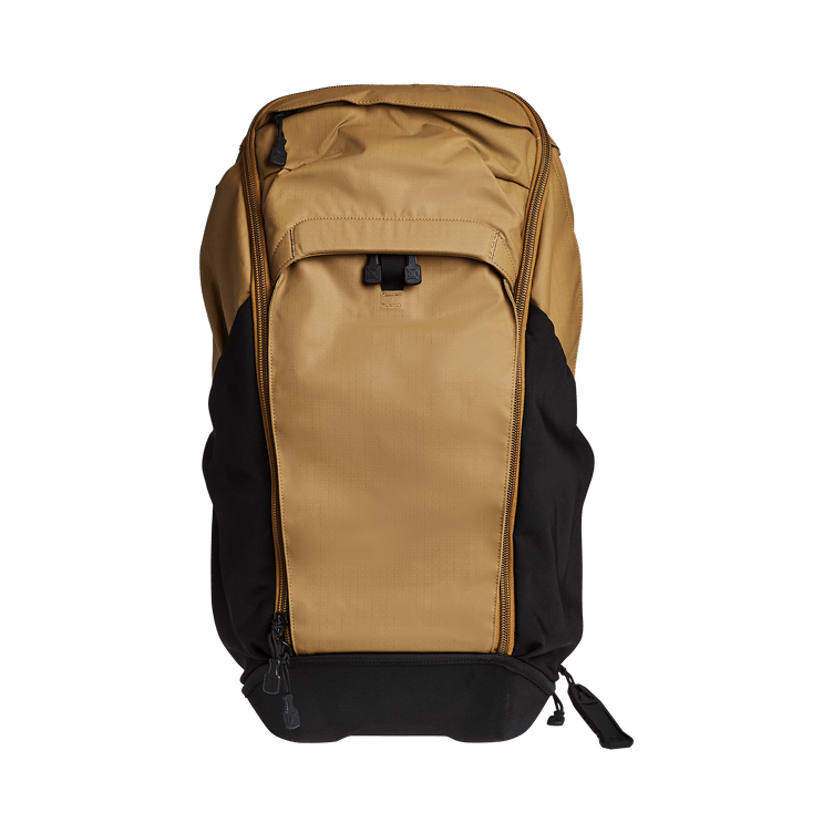 Vertx Pro Basecamp backpack in tan and black, designed for discreet gear storage and easy access.