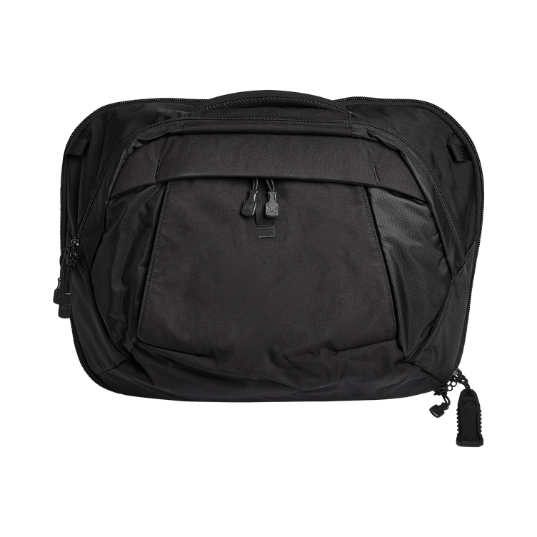 Vertx Pro Keryx bag in sleek black, ambidextrous design for versatile use, convertible from sling to messenger style.