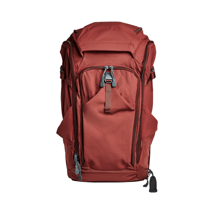 Vertx Pro Overlander backpack in red with multiple compartments and admin pockets for organized storage.