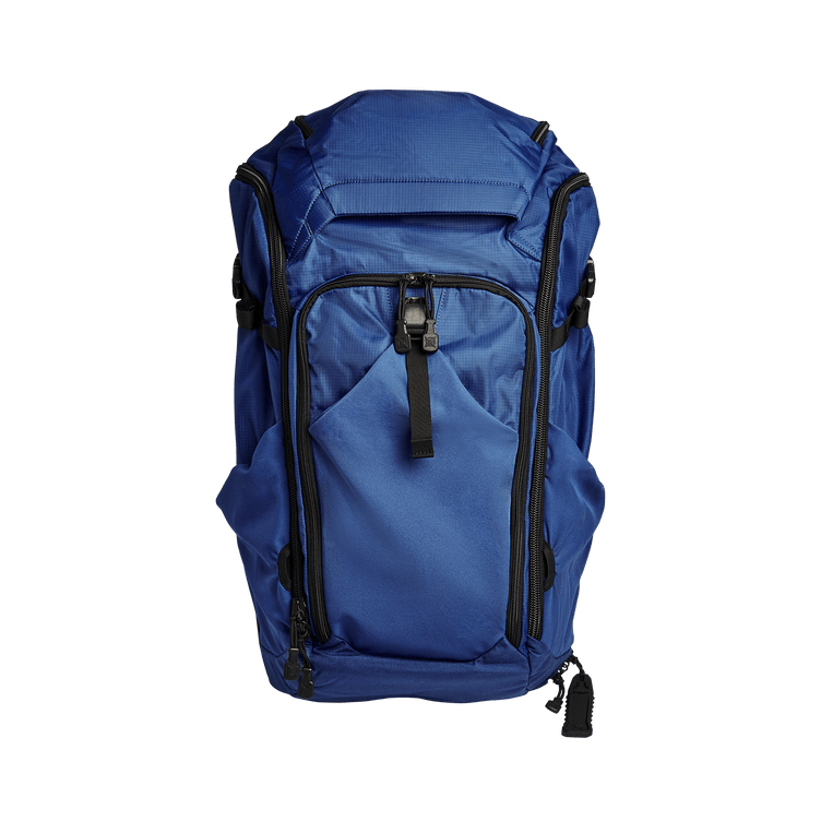 Vertx Pro Overlander backpack in blue, featuring multiple compartments and sleek design for optimal organization.