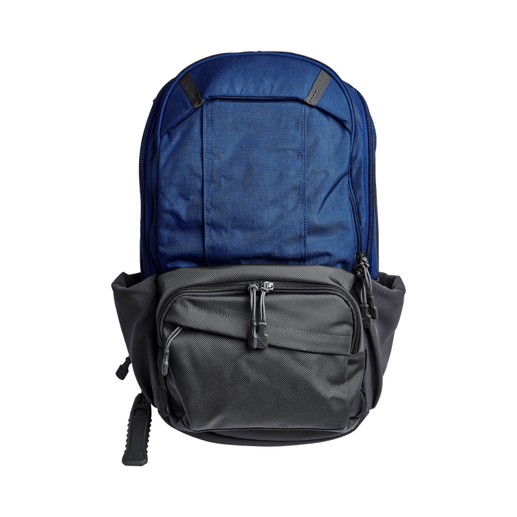 Vertx Pro Readypack in blue and gray, featuring multiple storage pockets and a sleek, tactical design.
