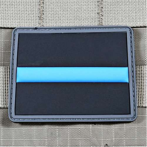 Violent Little Machine Shop Thin Blue Line patch featuring a blue stripe on a black background, perfect for display on gear.