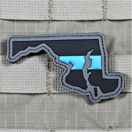Thin Blue Line patch featuring the outline of Florida, showcasing intricate details on a tactical background.