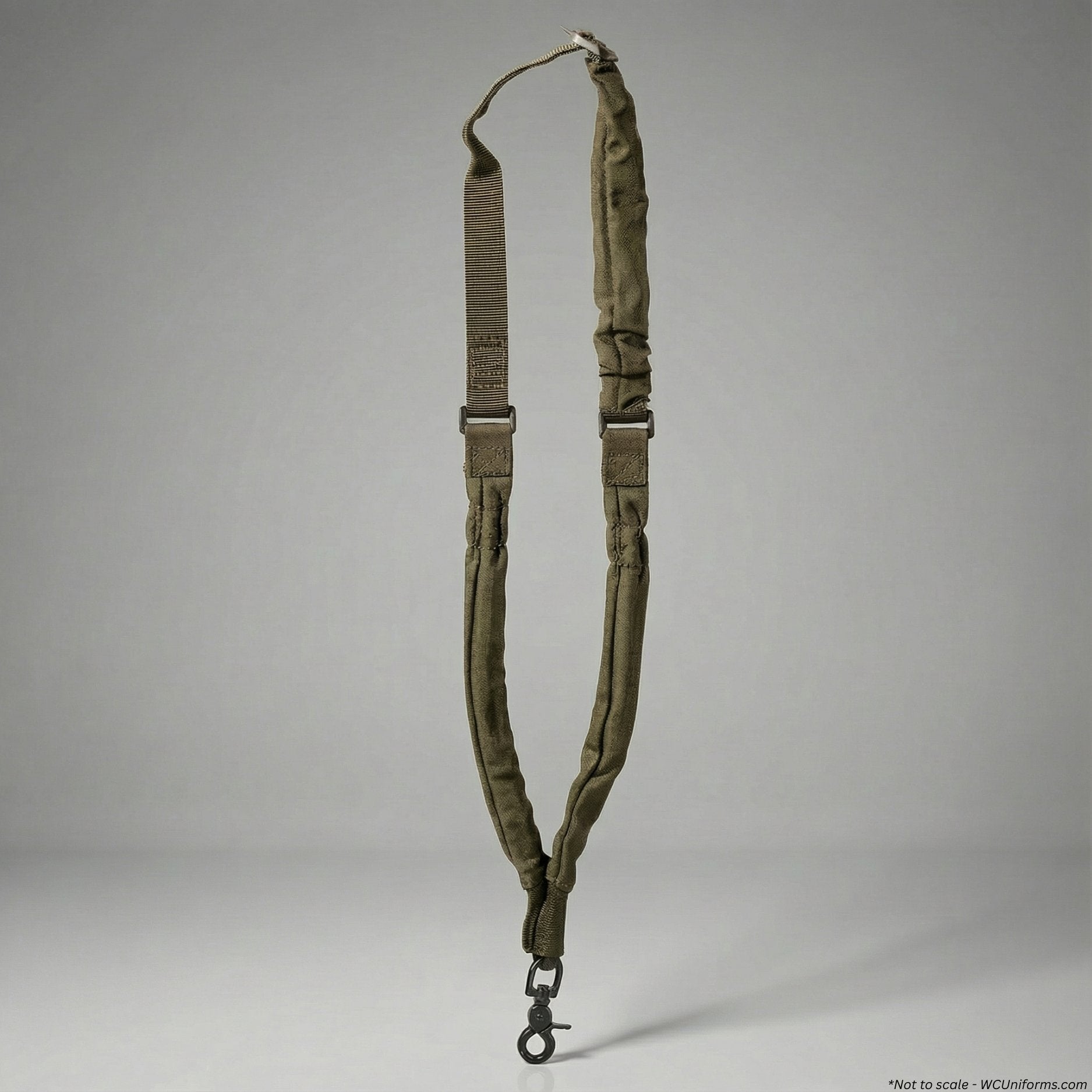 Green military-style rifle sling on a gray background