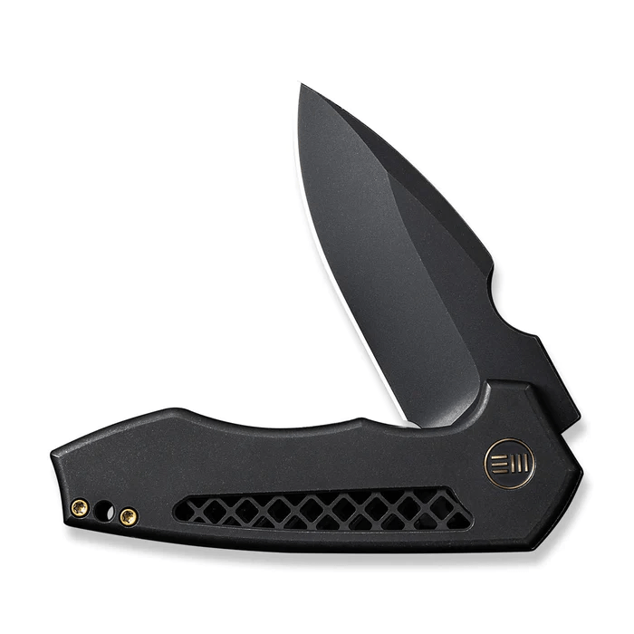 We Knife Harpen Flipper Knife featuring a sleek titanium handle and a sharp black blade for durability and style.