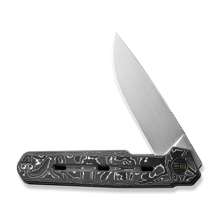 We Knife Navo Knife with Aluminum Foil Carbon Fiber Handle and CPM 20CV Blade in Hand Rubbed Satin finish.