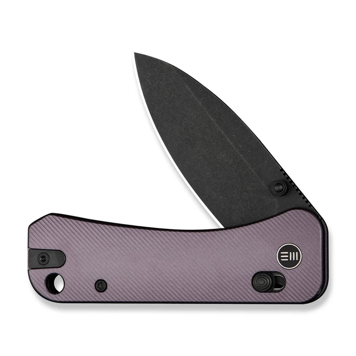 WE Knife Banter 2 thumb stud knife with purple aluminum handle and black blade, showcasing premium craftsmanship and design.