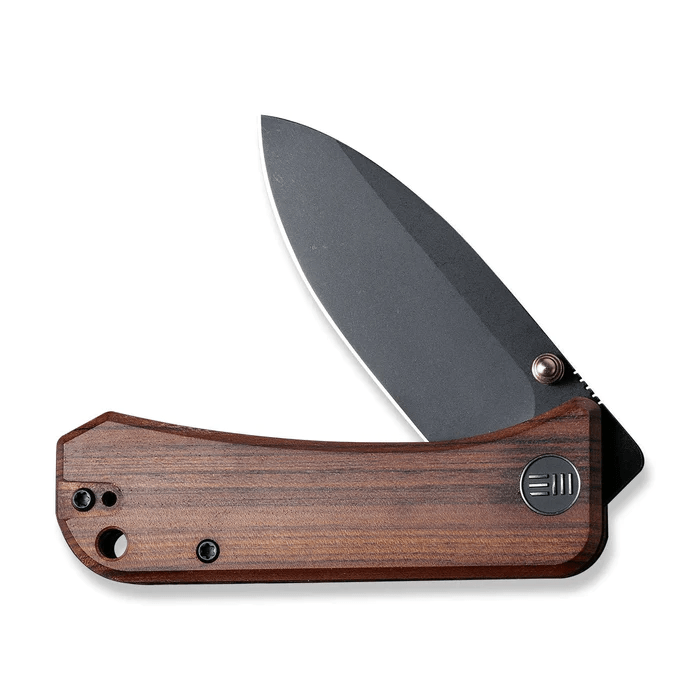 We Knife Banter Thumb Stud Knife with wood handle and CPM S35VN blade, compact design for everyday carry.