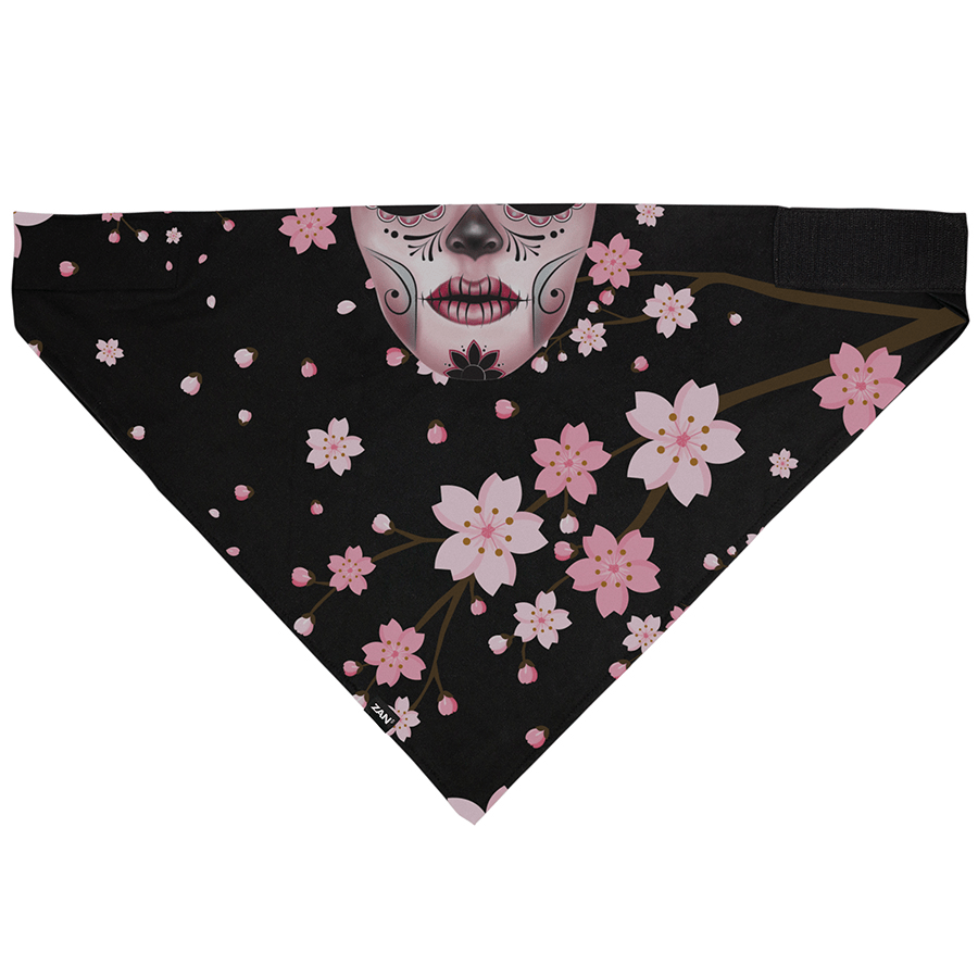 Zan Headgear Bandanna with floral design and skull, offers comfort and UV protection under helmets or alone.