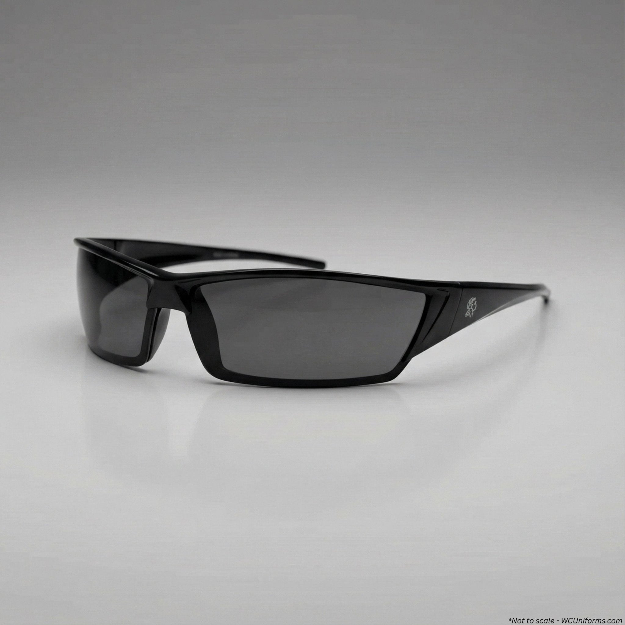 Black sunglasses on a gray background