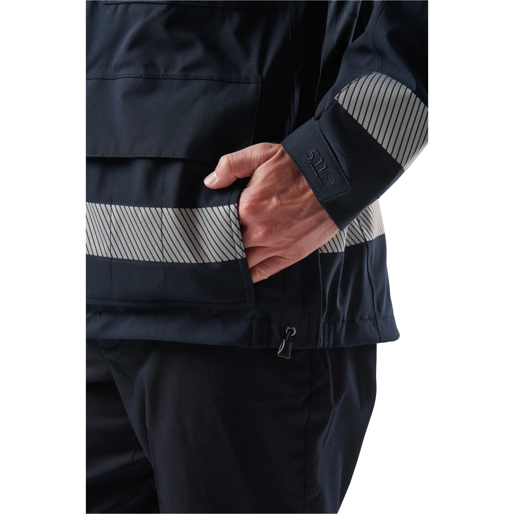 Close-up of 5.11 Tactical Responder Parka 2.0 showing reflective stripes and secure pocket for first responders.