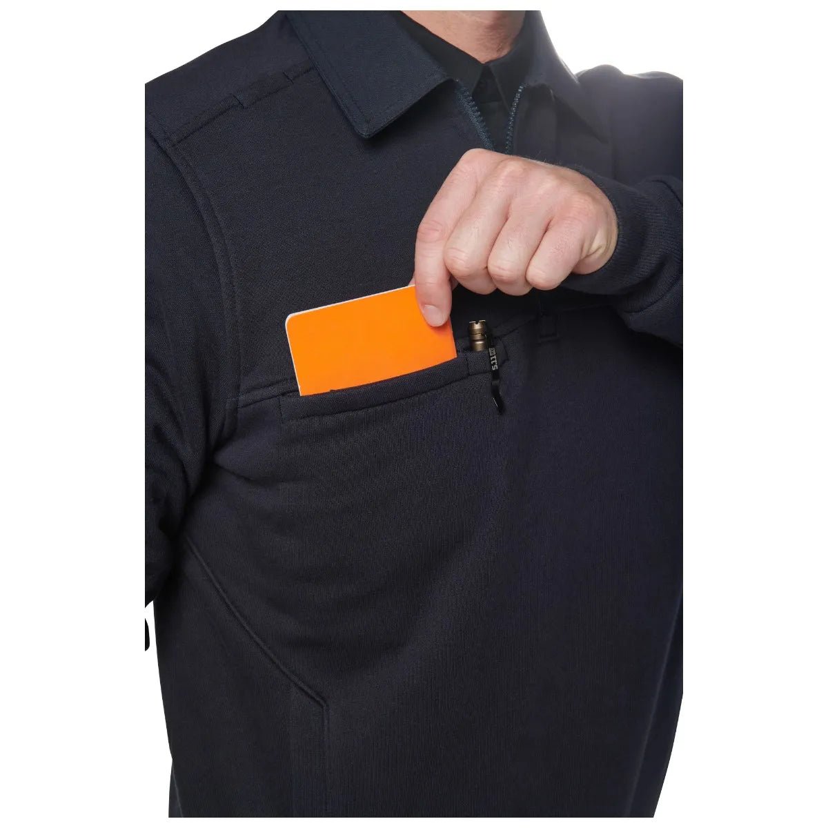 Break-Through chest pocket holding a notepad on the 5.11 Canvas 2.0 job shirt