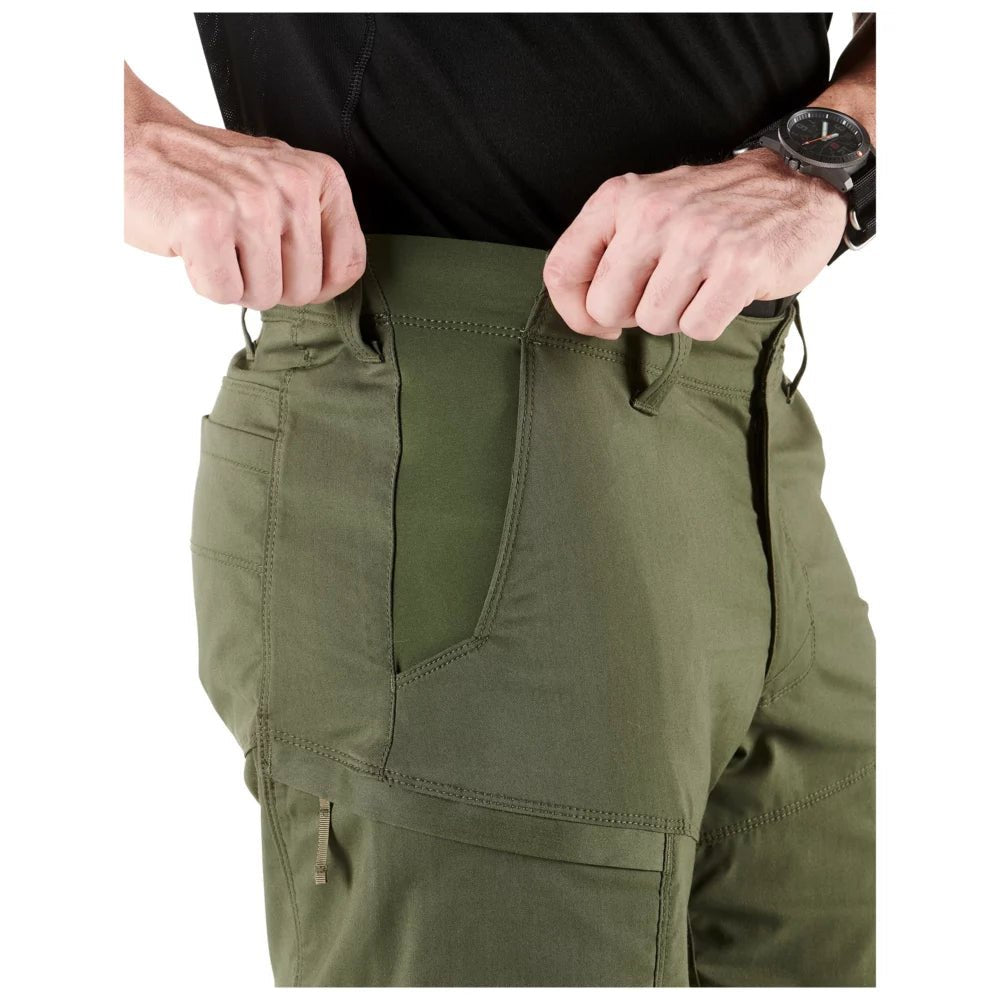 Front hand pocket and low-profile cargo pocket detail on the 5.11 Apex Pant in green