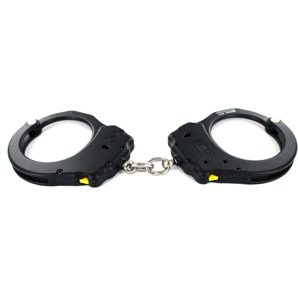 Top edge of ASP Ultra Plus chain cuffs with yellow keyless double lock indicators