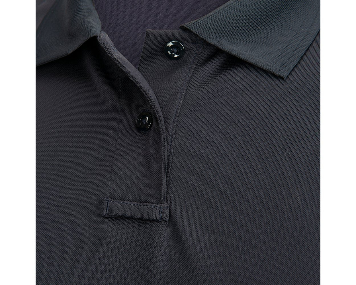 Button placket and center placket loop for a radio mic on the Flying Cross Impact Polo