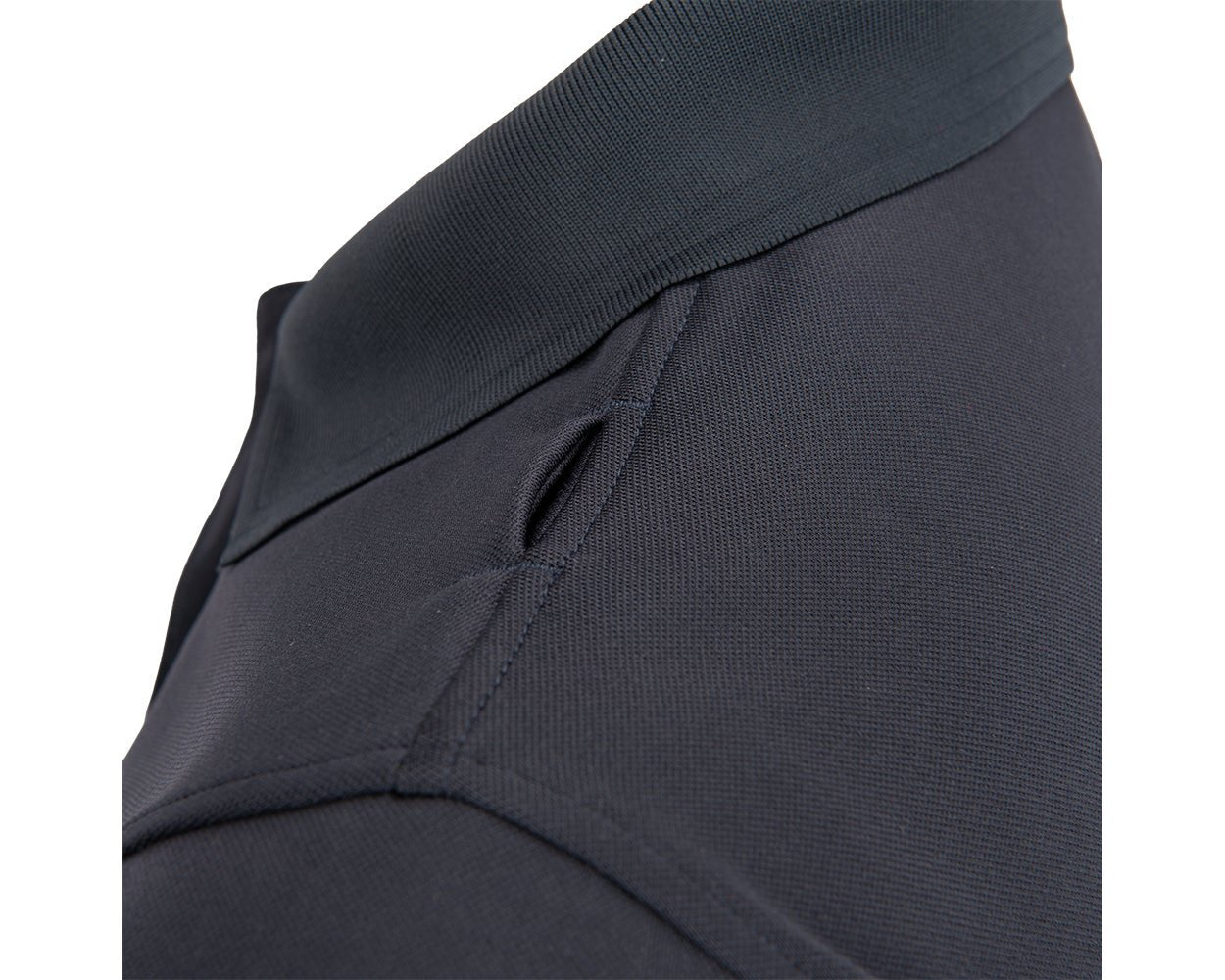 Shoulder mic tab on the Flying Cross Impact Polo for radio mic cords